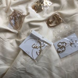 Gold face & body silhouette earrings
